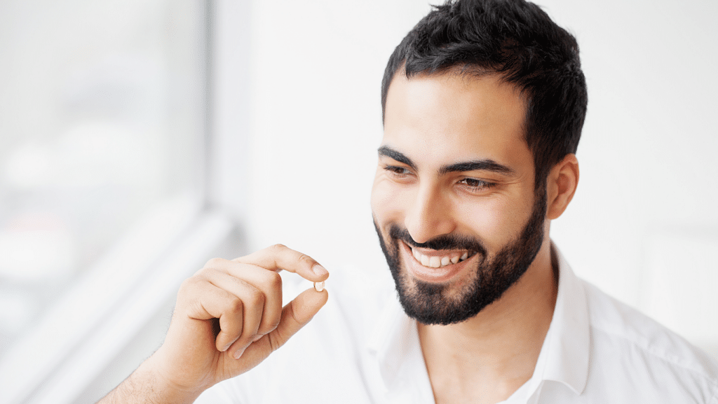 A man taking supplement to optimize his reproductive health
