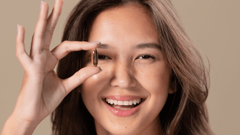 An image of a woman taking eye supplement