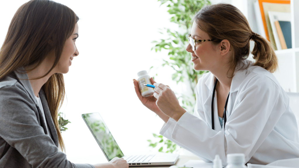 An image of a woman consulting to a doctor