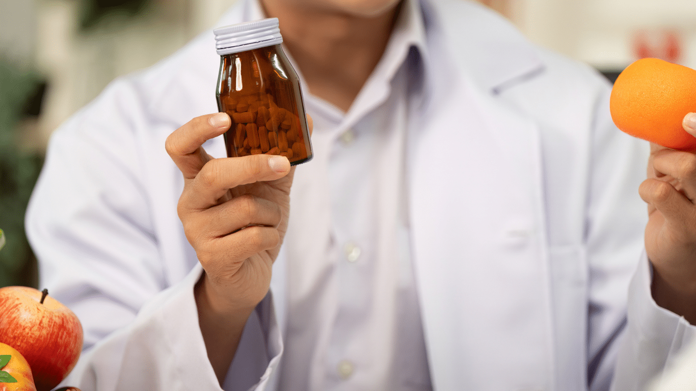 An image of a health professional holding a bottle of suuplement