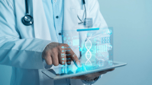 A close-up of a doctor in a white lab coat using a digital tablet that projects a futuristic, blue holographic interface. The hologram displays a DNA double helix, various organ icons, and data charts with percentages.