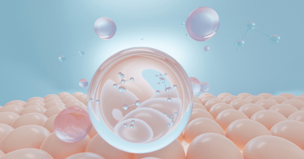 A digital graphic demonstrating skincare concepts. Floating water or chemical molecule models and translucent pink spheres hover above a stylized grid of smooth, beige rounded shapes meant to represent skin cells, all set against a soft blue background.