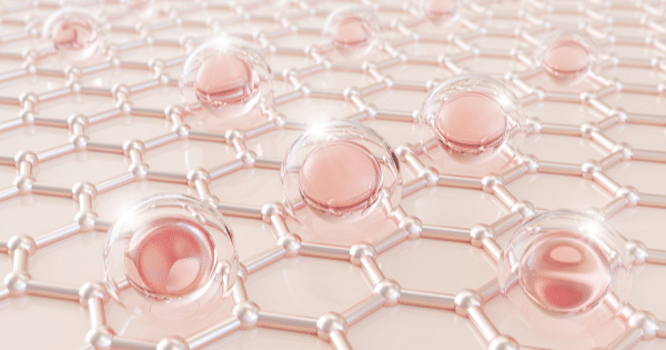 3D rendering of pink glossy molecules resting on a metallic hexagonal skin structure.