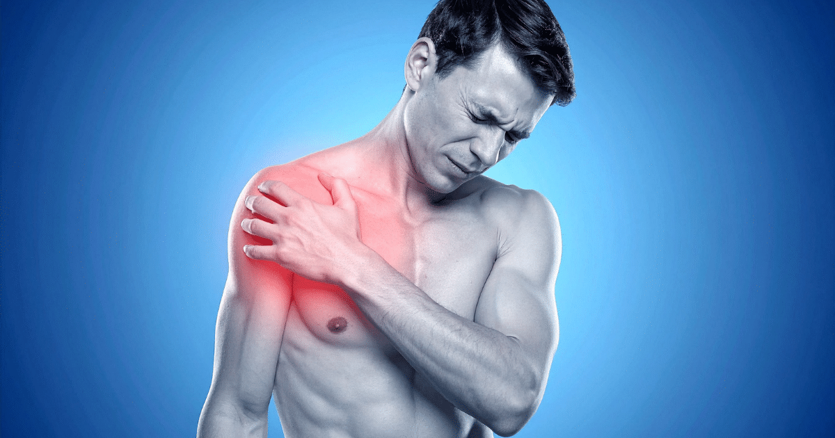 Shirtless man clutching his painful shoulder with a red glow highlighting the injury area.