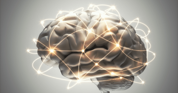 A 3D model of a human brain illuminated by an intricate, glowing network of interconnected lines and bright data nodes against a clean grey background.
