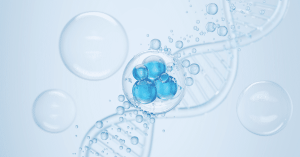 3D graphic of blue liquid spheres floating near a glass-like DNA double helix strand.